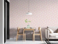 Minimalist dining area featuring flower wallpaper and a hanging pendant light.