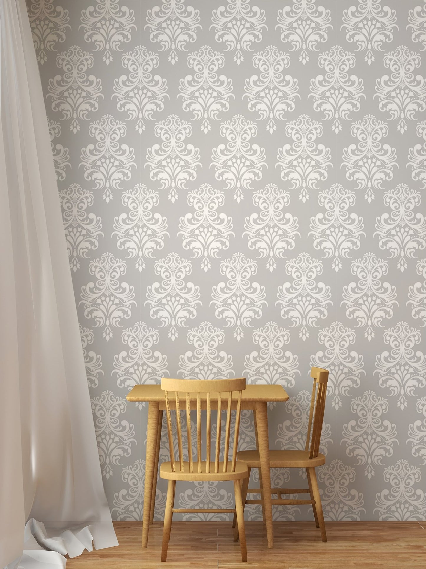 Damask pattern wallpaper in a dining area with a wooden table and chairs.