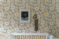White Daisy Flower Wreath Branch and Leaves Wallpaper in a nursery with a crib.
