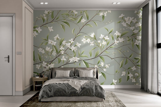 Minimalist wall mural featuring slender branches and white floral petals.