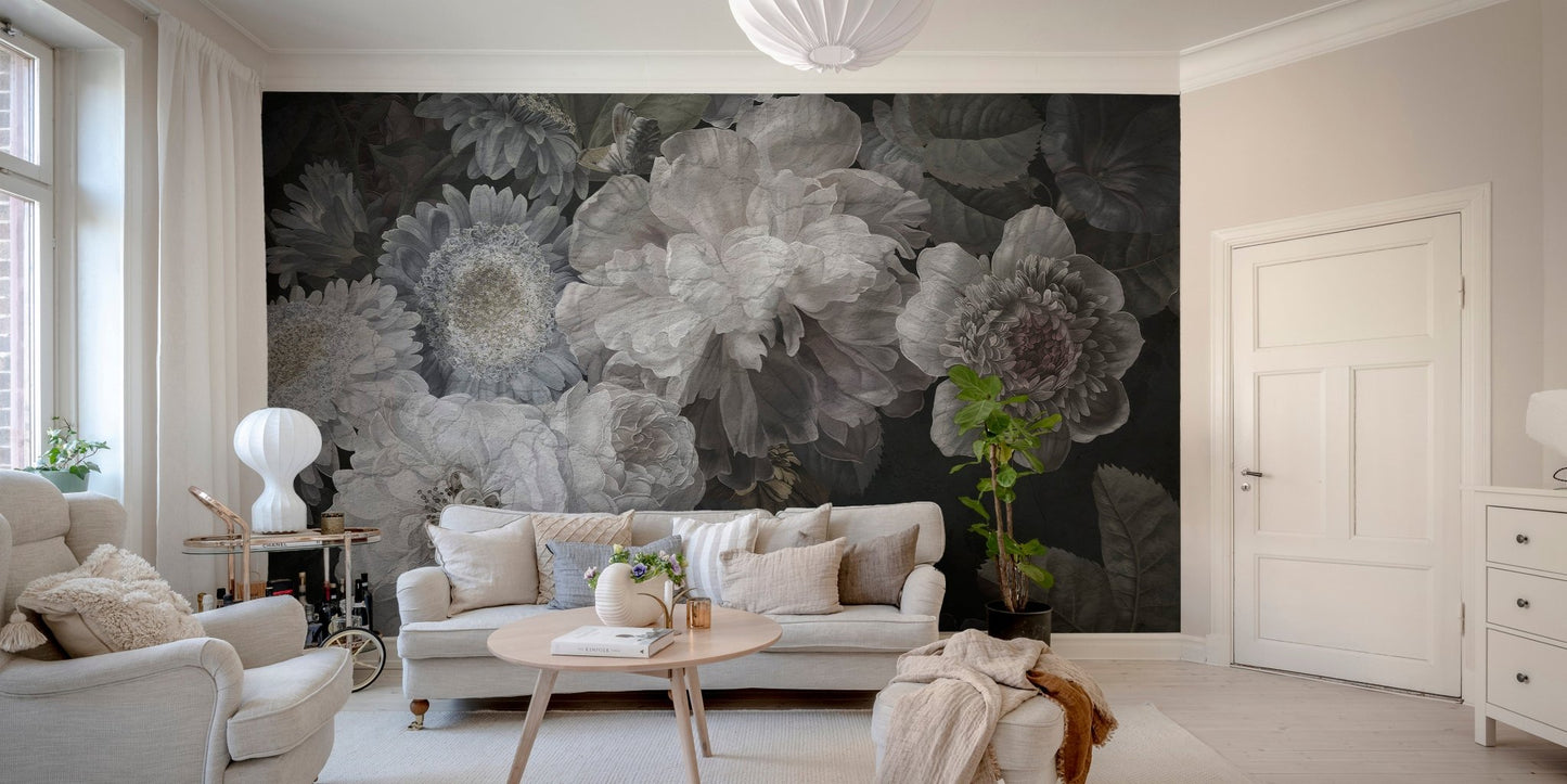 Monochrome wildflower wall mural in a minimalist living area with a beige rug.