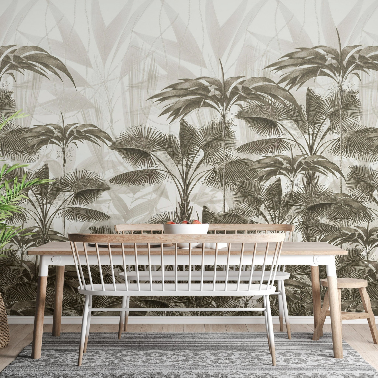 Wooden dining table set against a Wild Palm Canopy wall mural in olive green.