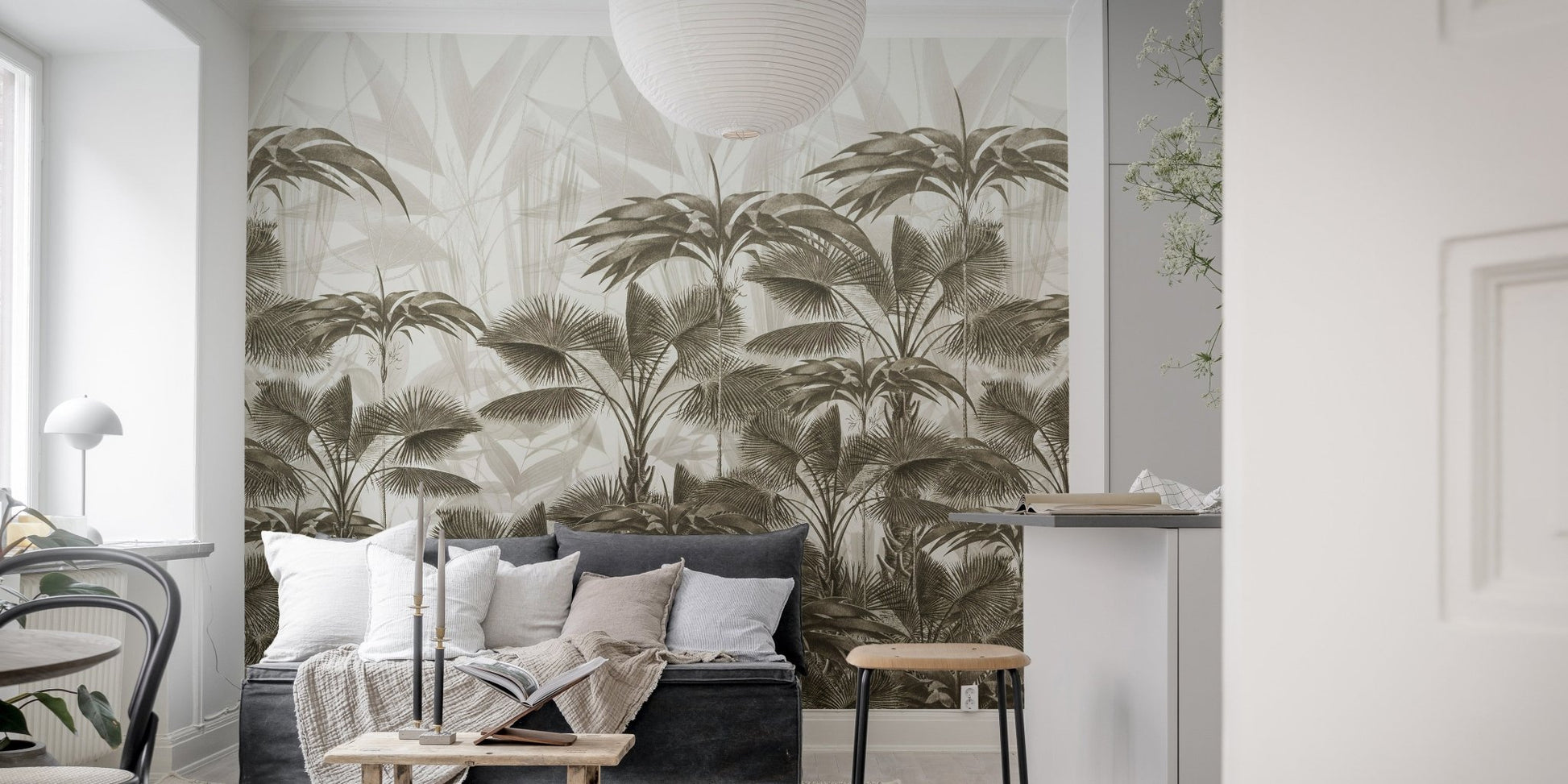 Minimalist living room featuring a Wild Palm Canopy wall mural behind the sofa.