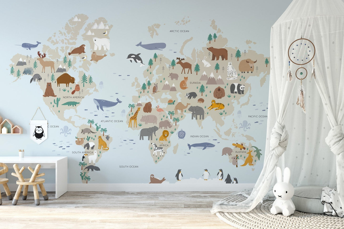 Wild safari adventure mural featuring animals and lush landscape in kids room.
