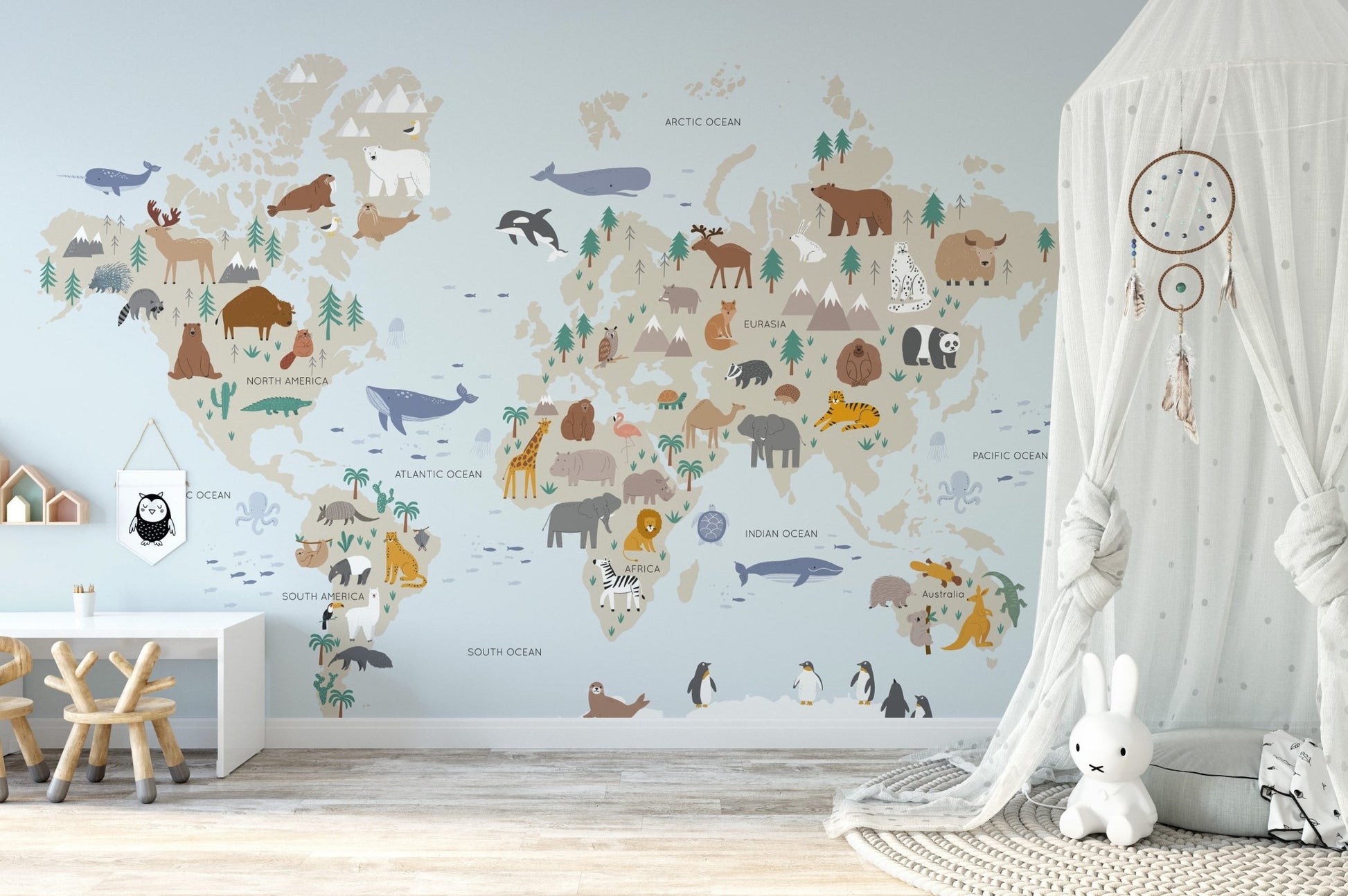 Wild safari adventure mural featuring animals and lush landscape in kids room.
