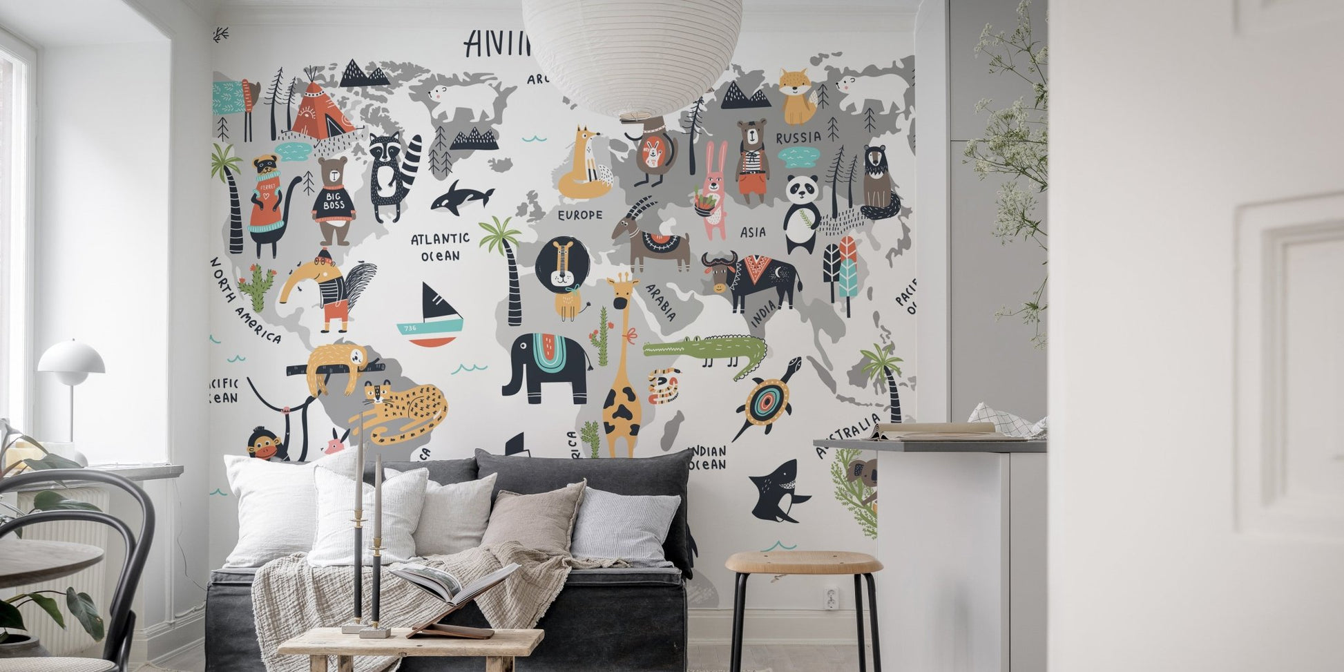 Wild Wonders mural featuring animals on a colorful world map in living area.
