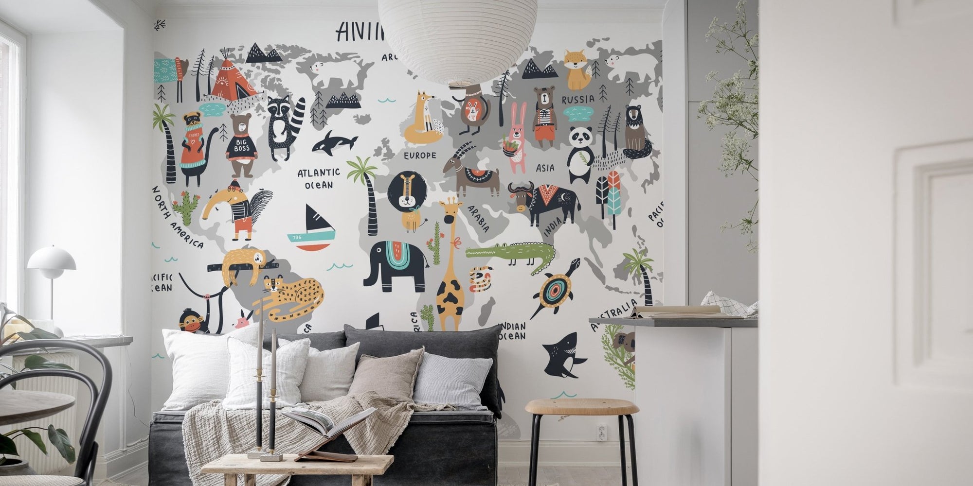 Wild Wonders mural featuring animals on a colorful world map in living area.
