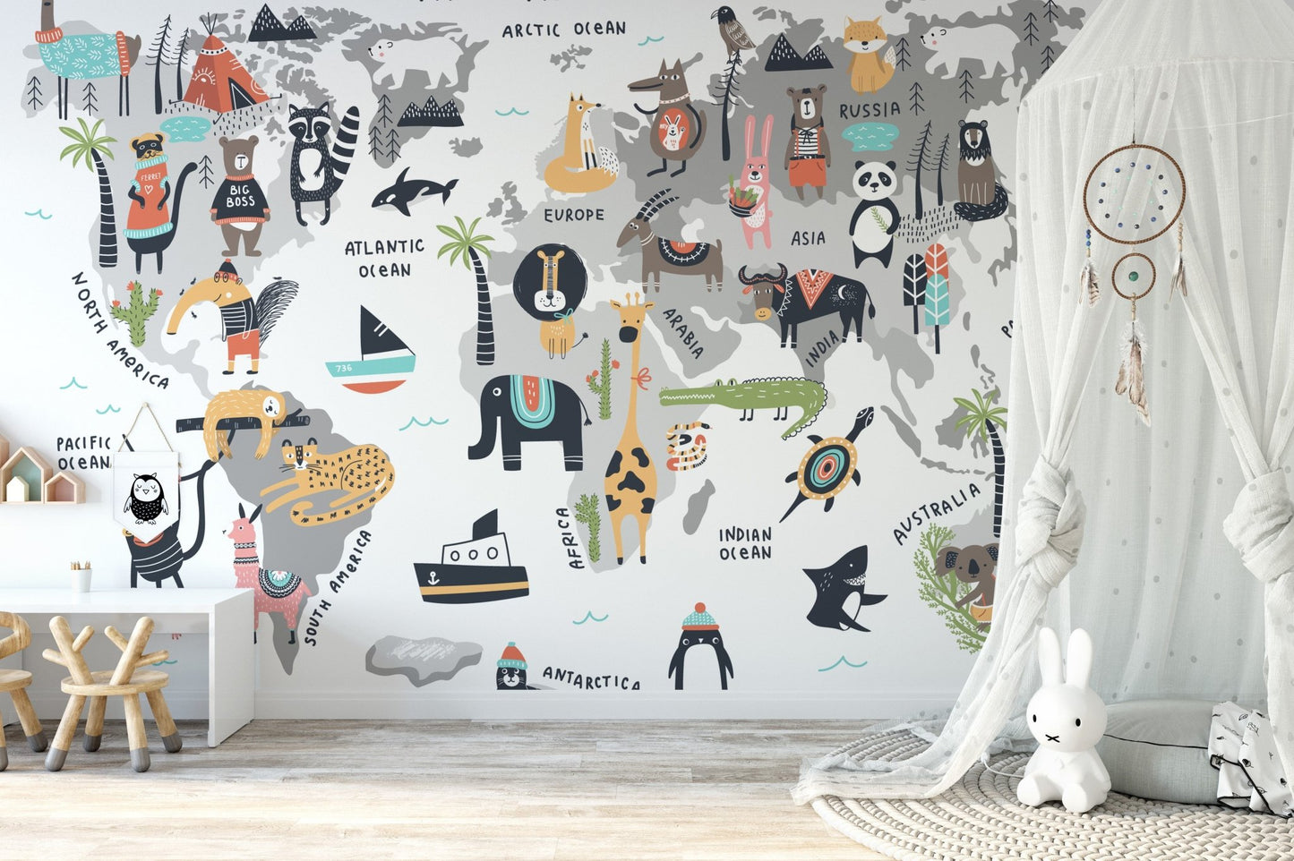 Artistic mural of animals across a vibrant world map for children room walls.

