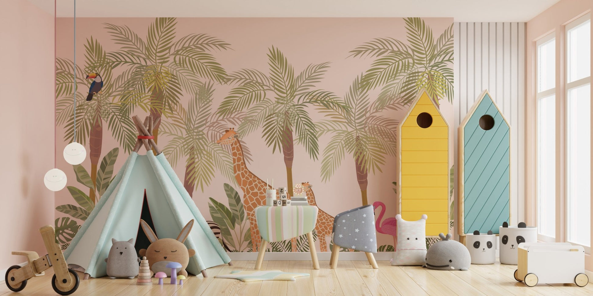 Tropical jungle adventure wall mural in a playroom with blue furniture and storage bins.