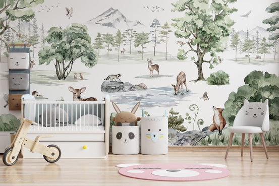 Watercolor winter deer forest wallpaper mural with snowy mountains.