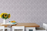 Winter forest wall mural with sunflowers on a wooden dining table.