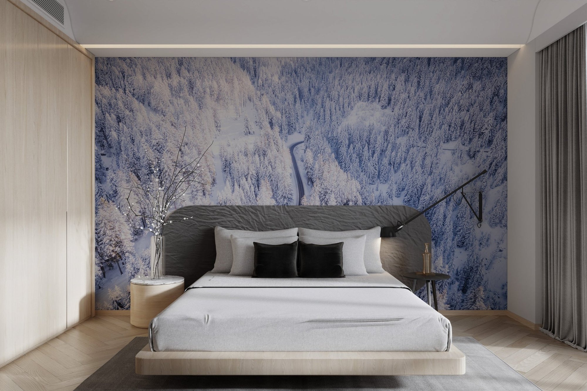 Winter wonderland forest wallpaper featuring a winding road through snowy pines.