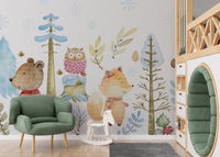 Winter wonderland wildlife mural adding elegance to nursery interiors.
