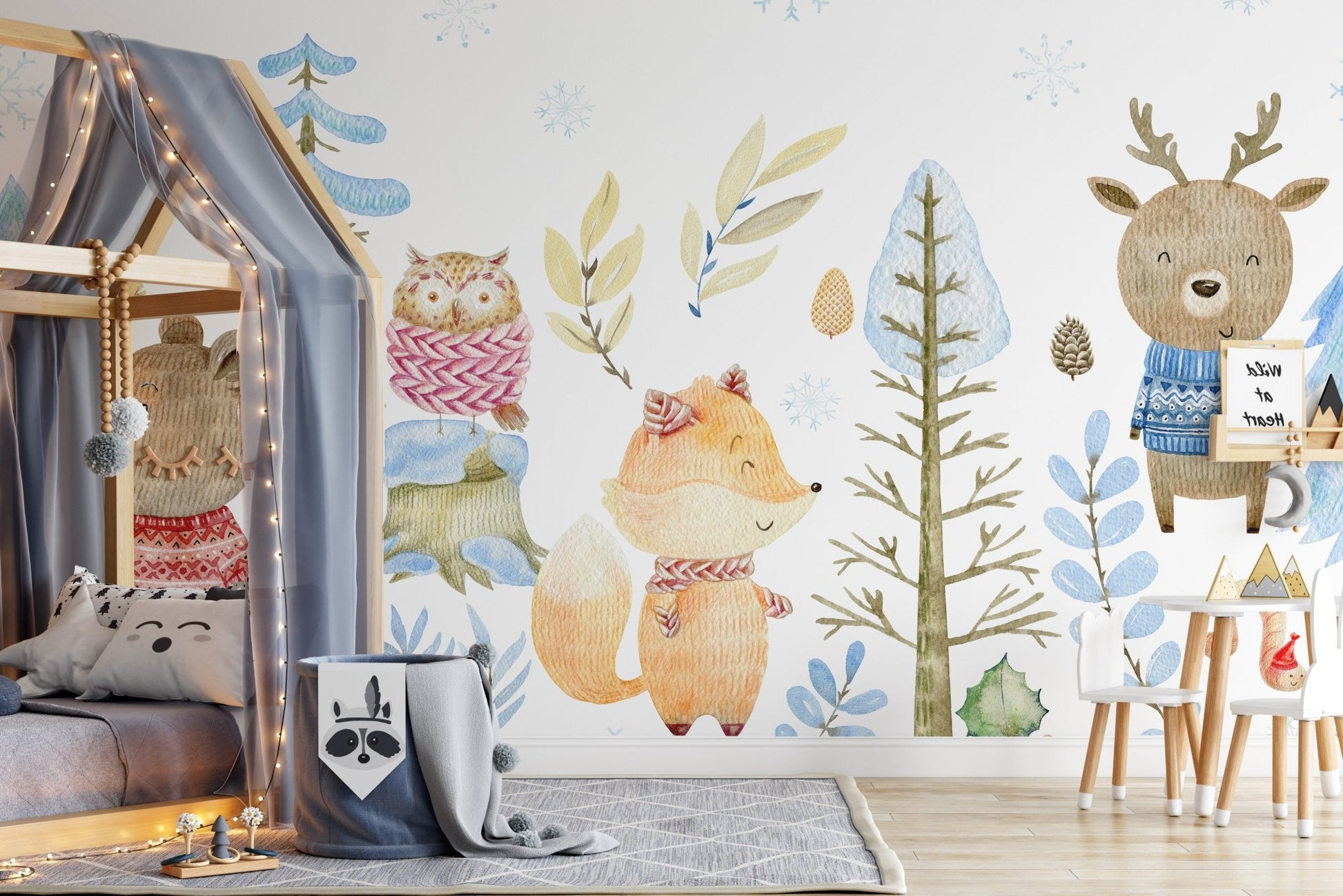 Captivating mural of wildlife in a serene winter wonderland for kids room.