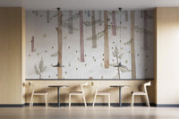 Forest theme wall mural with soft wood trunks and string lights.