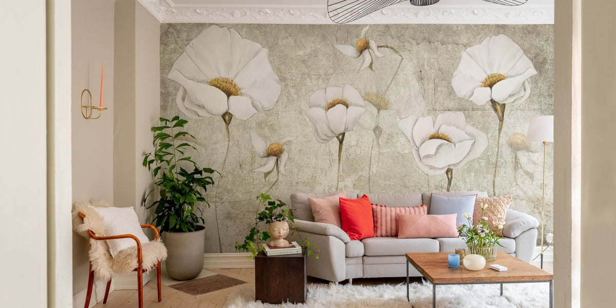 Worn White Blossom Oasis Wall Murals in living room with grey sofa