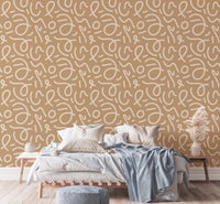 Contemporary bedroom wallpaper with yellow line art on a mustard base