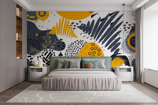 Modern bedroom with yellow and gray abstract shapes wallpaper mural and green headboard.