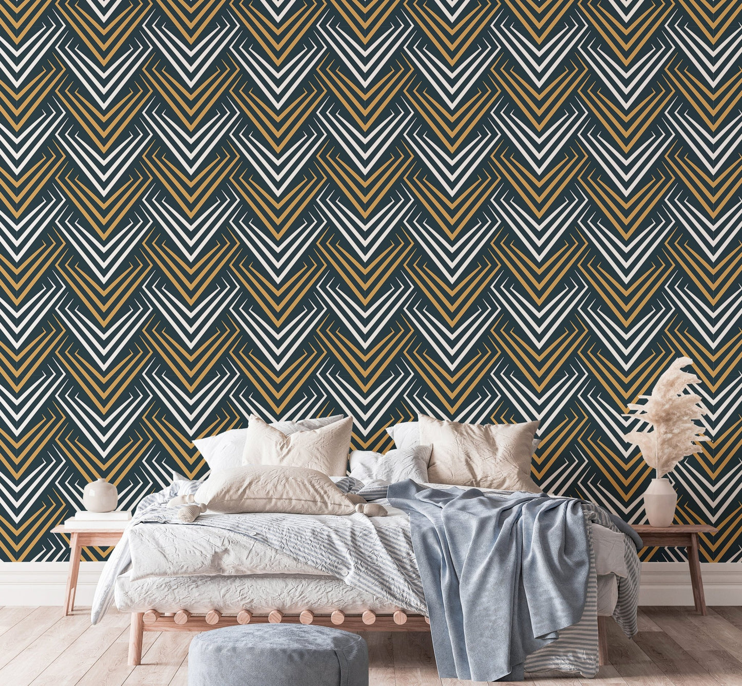 Art deco wallpaper in a bedroom with white bedding and wooden bedside tables.