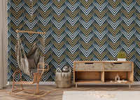 Art deco wall mural in a nursery room with a wooden sideboard and wicker chair.