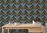 Yellow and White Vintage Abstract Art Deco Wallpaper behind a light wood office desk.