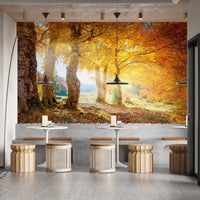 Autumn Forest Mural with Yellow Leaves fin a cafe with pendant lighting.